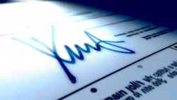 an ink signature on a mail ballot checked for verification