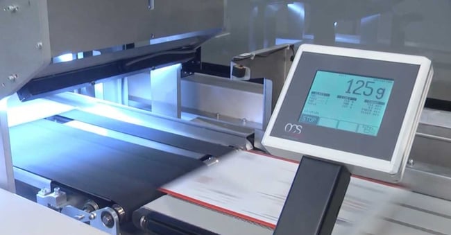 camera performing automated inline scanning for mail and parcel verification on conveyor