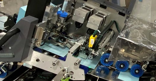 Multiple folder/carrier feeder stations on card attaching mail inserter equipment