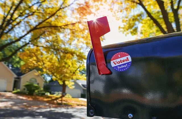 Kane County IL mailbox with delivered ballot